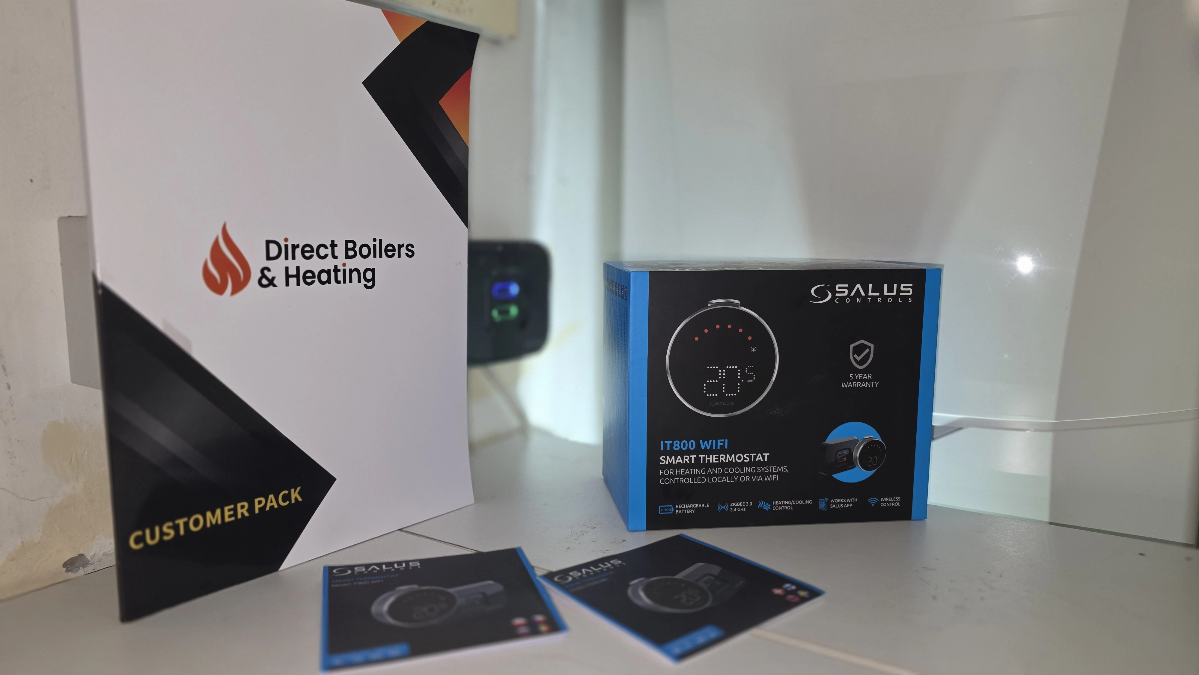 Direct Boilers customer pack and smart thermostat
